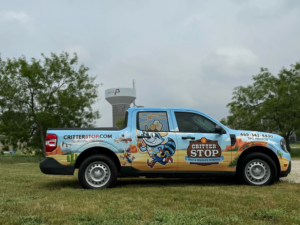 Technician setting wildlife trap