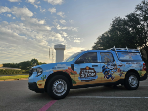 Technician setting wildlife trap